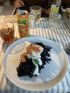 Squid ink pasta and burrata, Venice